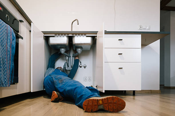 Professional Emergency Plumber technician working in Linwood, PA